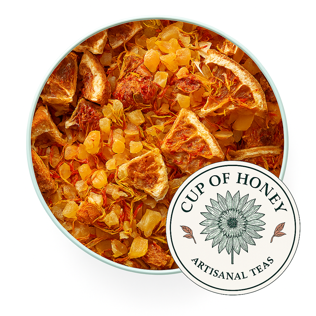 Bright tropical mango herbal tea with pineapple, citrus, and floral petals, a sweet fruit‑forward loose‑leaf blend from Sip of Honey 