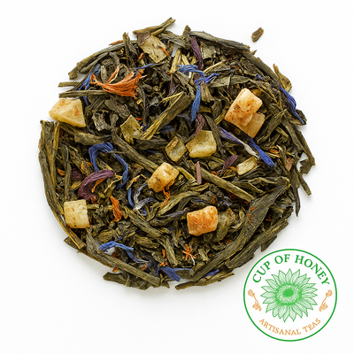 A vibrant pineapple and mango green tea blended with elderberries, beetroot, and bright florals for a sweet, antioxidant‑rich tropical sip.