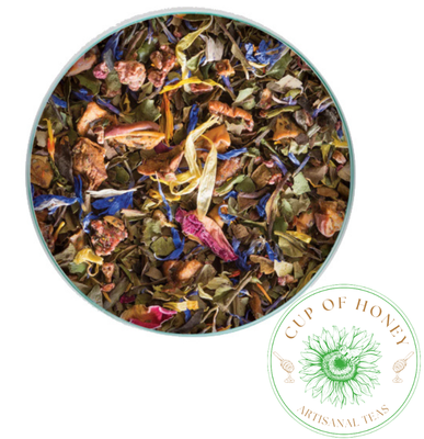 Sip of Honey Pomegranate Topia loose leaf tea with dried pomegranate arils and herbs
